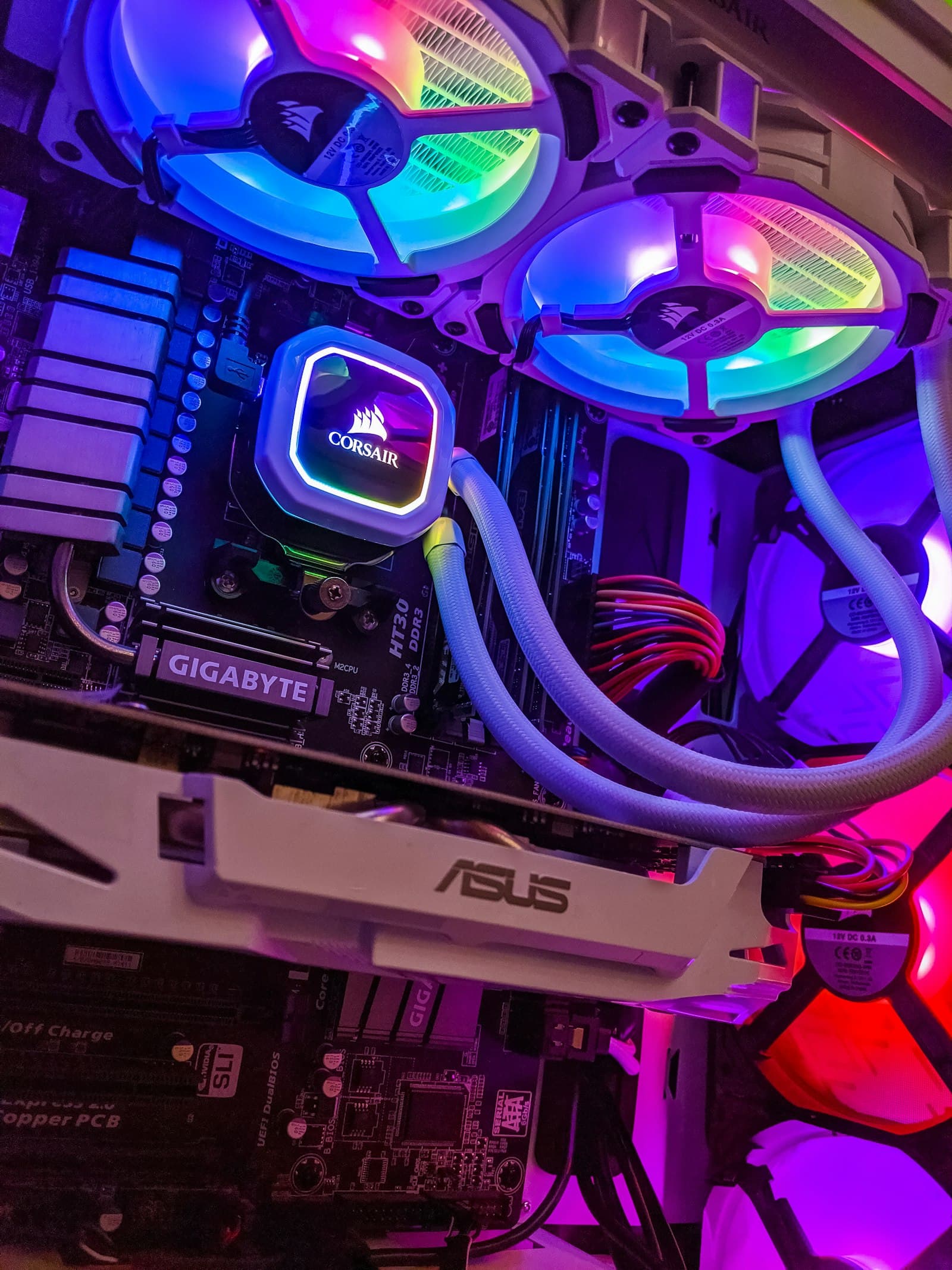 Inside a desktop build, with the cooler, motherboard, and graphics card visible