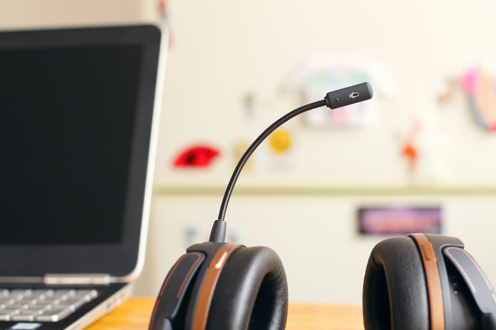 Headset and laptop on a support desk