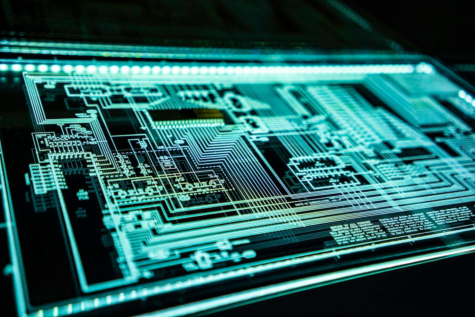 A lit circuit diagram on a glass panel
